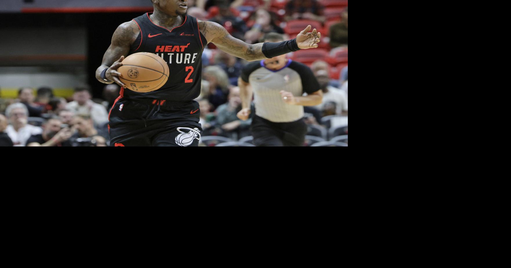 Miami Heat guard Terry Rozier gestures during action against the Boston Celtics during the first half at Kaseya Center on Feb. 11, 2024, in Miami.