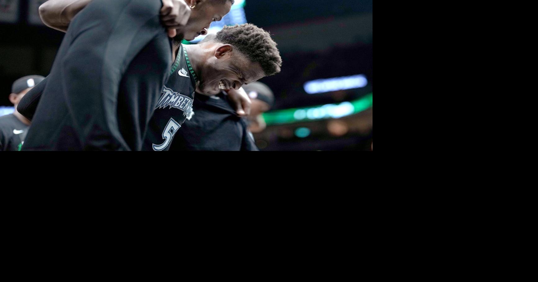 Minnesota Timberwolves' Anthony Edwards was helped from the court after being injured in a game against the Denver Nuggets at Target Center on April 25, 2026, in Minneapolis.