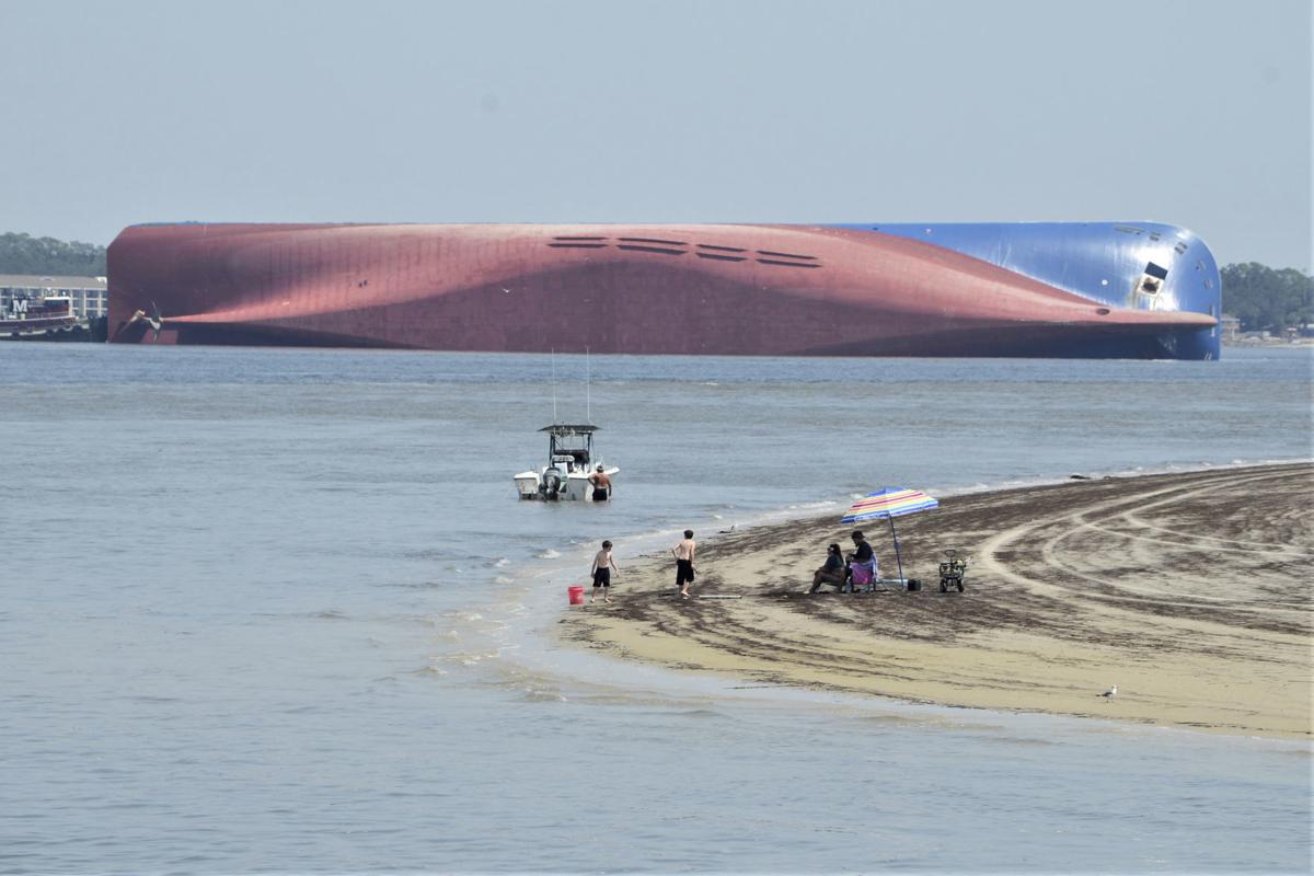 Tipped Freighter Draws Crowd Of Onlookers Local News The