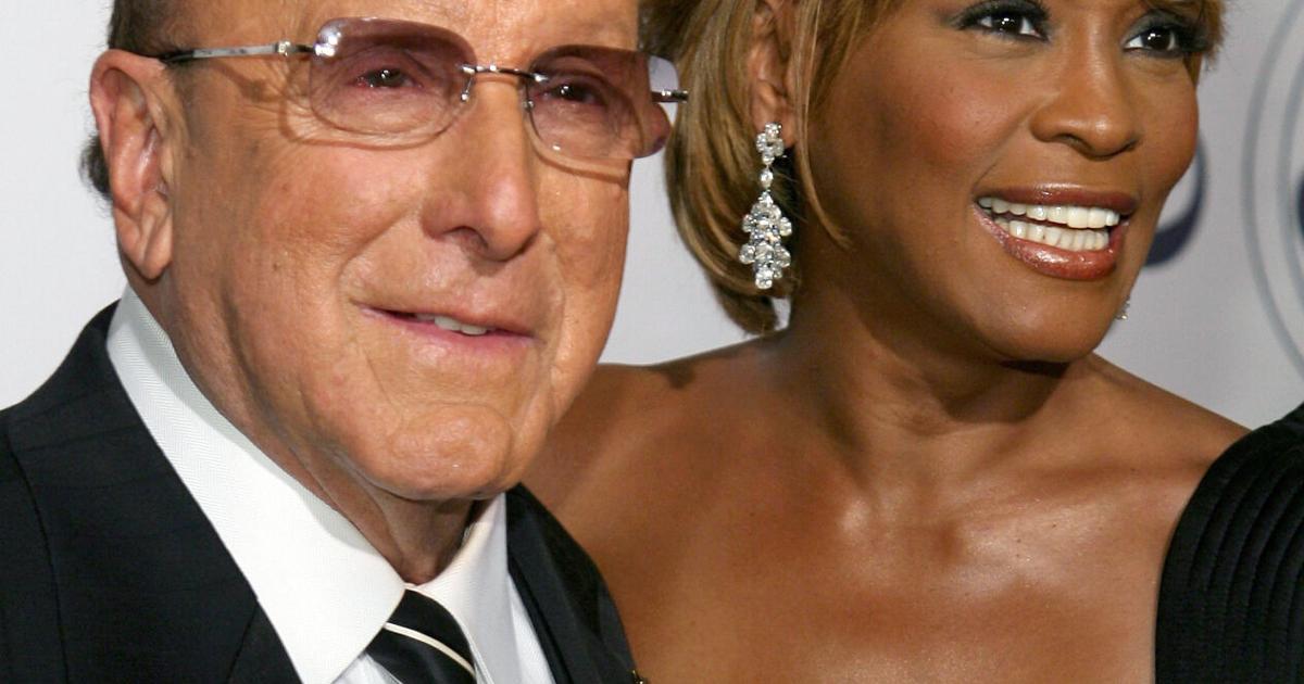Producer Clive Davis and singer Whitney Houston arrive at the 17th Annual Mercedes-Benz Carousel of Hope Ball at the Beverly Hilton Hotel on Oct. 28, 2006 in Beverly Hills, California.