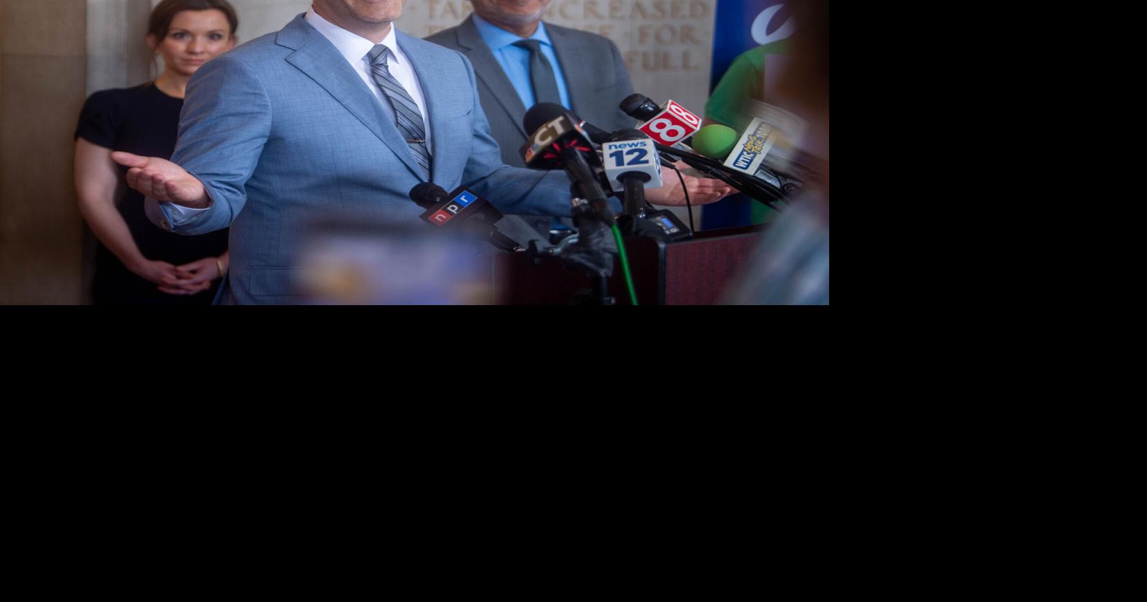 Josh Elliott speaks to the media as he announces his candidacy for governor during a press conference at Hamden Town Hall, July 14, 2025, in Connecticut.