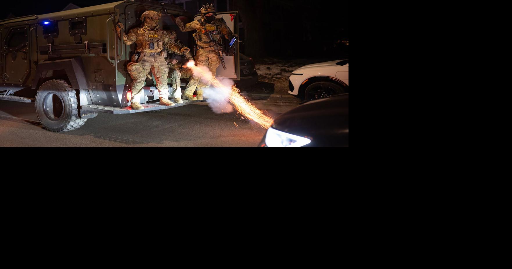 A federal officer fires an incendiary round in the midst of massive protests in north Minneapolis in January after Julio Cesar Sosa-Celis was shot by a federal agent during Operation Metro Surge.