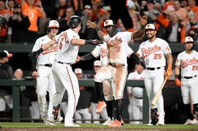 Adley Rutschman of the Baltimore Orioles celebrates a double in the News  Photo - Getty Images