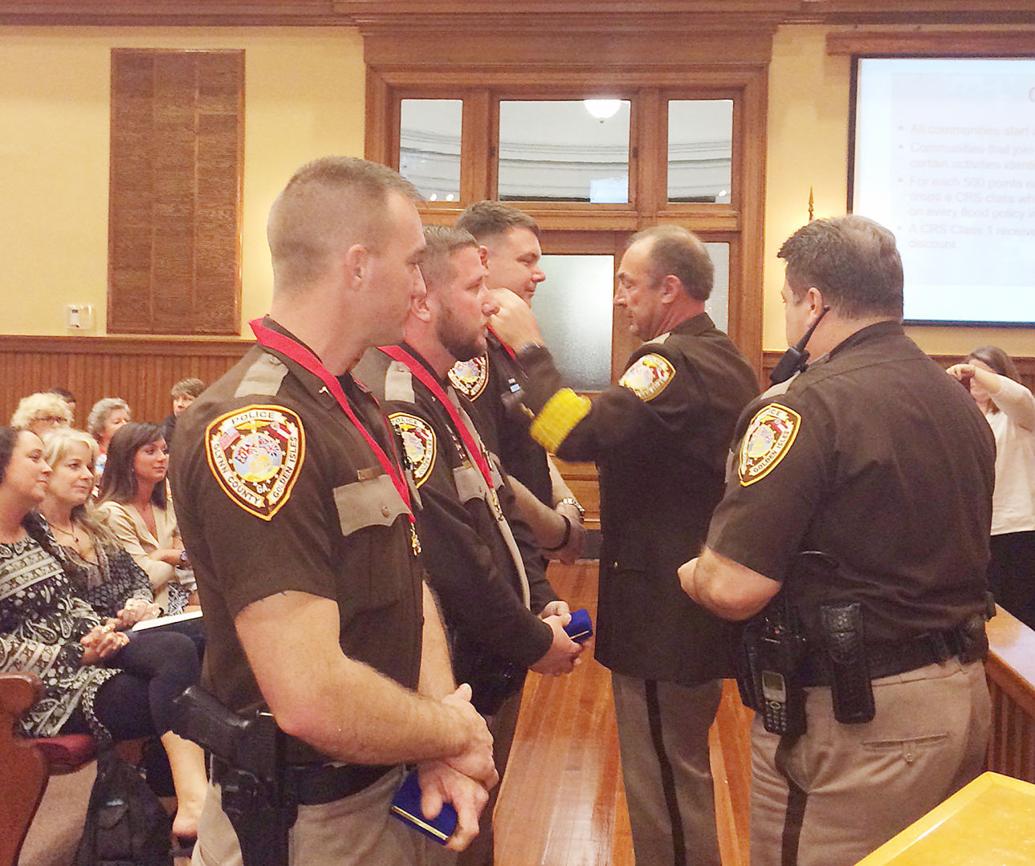 Glynn County officers honored with medal for saving life Local News