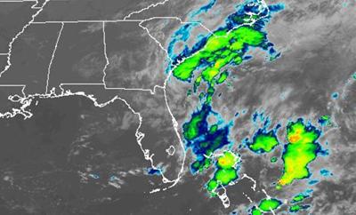 The National Hurricane Center keeps track of a system with potential to form off the coast of Florida.