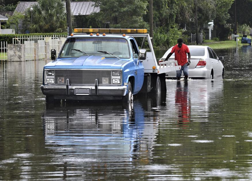 Storm drops torrential amounts of rain, leading to area flooding