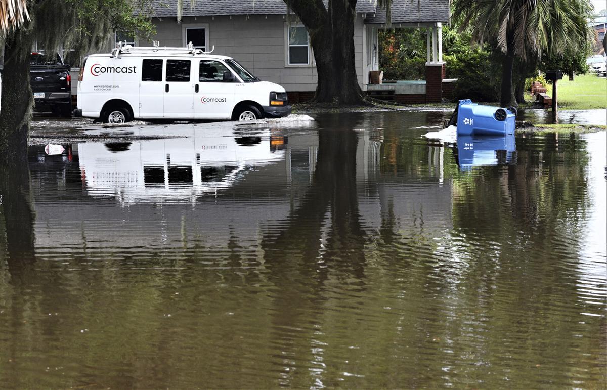 Storm drops torrential amounts of rain, leading to area flooding