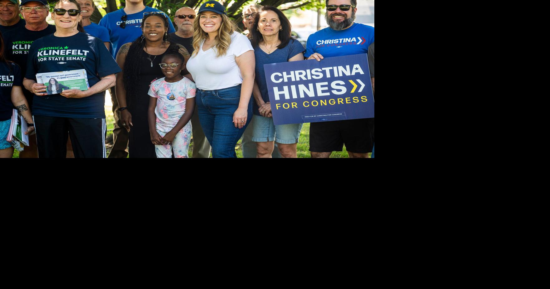 Christina Hines, a candidate for Michigan's 10th Congressional District, fourth from right, poses for a group photo with supporters before an afternoon of canvassing July 11, 2026 in Eastpointe, Mich..