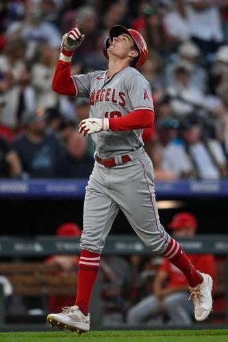 Mickey Moniak of the Los Angeles Angels celebrates as he rounds the bases  after hitting a