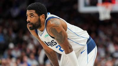 Dallas Mavericks guard Kyrie Irving looks on during the second half against the San Antonio Spurs at American Airlines Center on Thursday, Feb. 23, 2023, in Dallas.