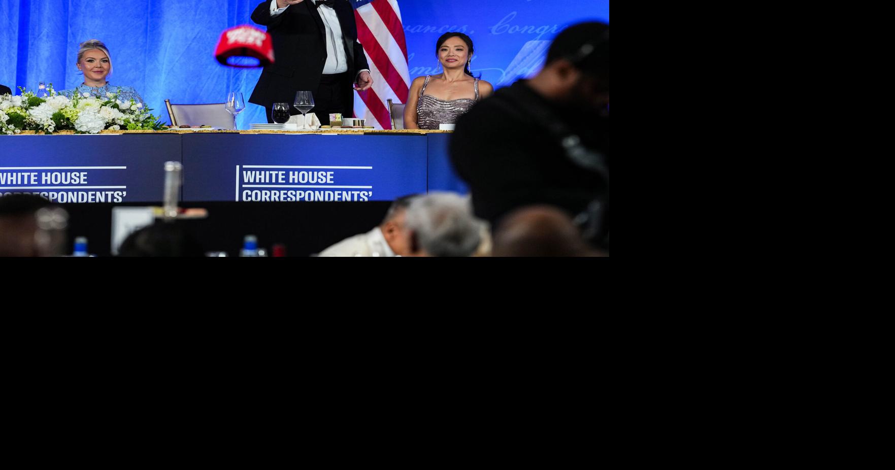 U.S. President Donald Trump tosses his TRUMP 2028 hat to an attendee during the re-scheduled White House Correspondents Dinner in the Presidential Ballroom at the Waldorf Astoria on Friday, July 24, 2026, in Washington, D.C..