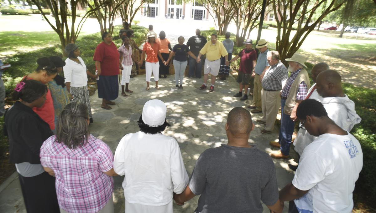 Demonstrators Protest Caroline Small Shooting At Courthouse