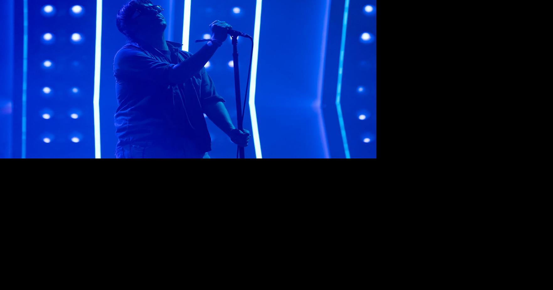 The Strokes' singer Julian Casablancas keeps fans in the dark through a lot of his band's short headlining set at the Minnesota Yacht Club festival Sunday, July 19, 2026, in St. Paul, Minnesota.