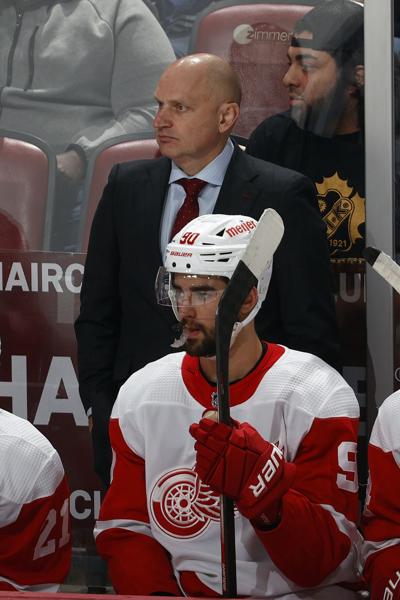 In this file photo from Dec. 8, 2022, Detroit Red Wings head coach Derek Lalonde behind the bench against the Florida Panthers at the FLA Live Arena in Sunrise, Florida.