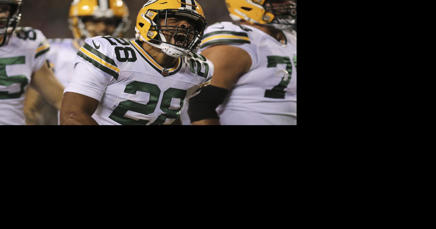 Green Bay Packers running back AJ Dillon yells after scoring a first-quarter touchdown against the Philadelphia Eagles on Sunday, Nov. 27, 2022 in Philadelphia.