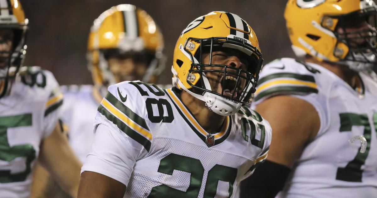 Green Bay Packers running back AJ Dillon yells after scoring a first-quarter touchdown against the Philadelphia Eagles on Sunday, Nov. 27, 2022 in Philadelphia.