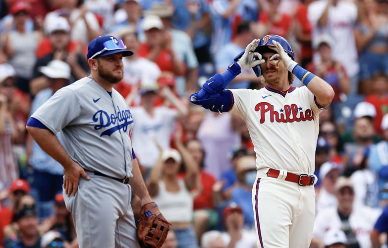 Big bats help Phillies out-pace blunders and bullpen woes in