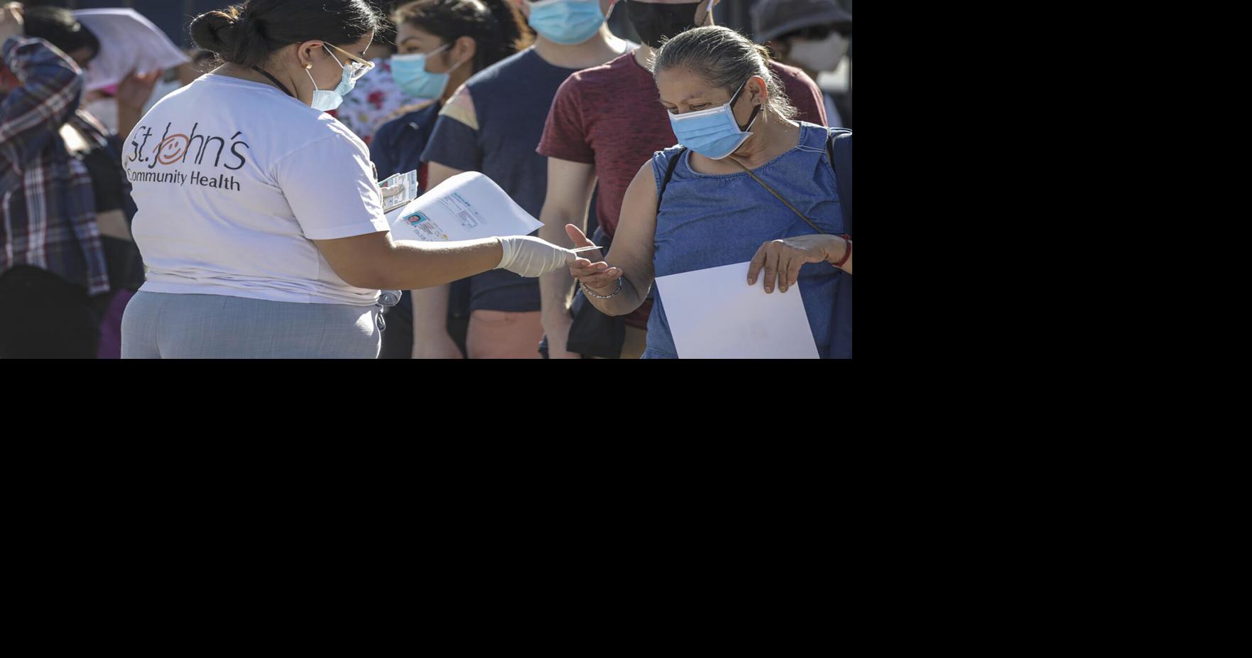 People wait in line to get Monkeypox virus vaccine at St.John' s Well Child& Family Center on Aug. 10, 2022, in Los Angeles.