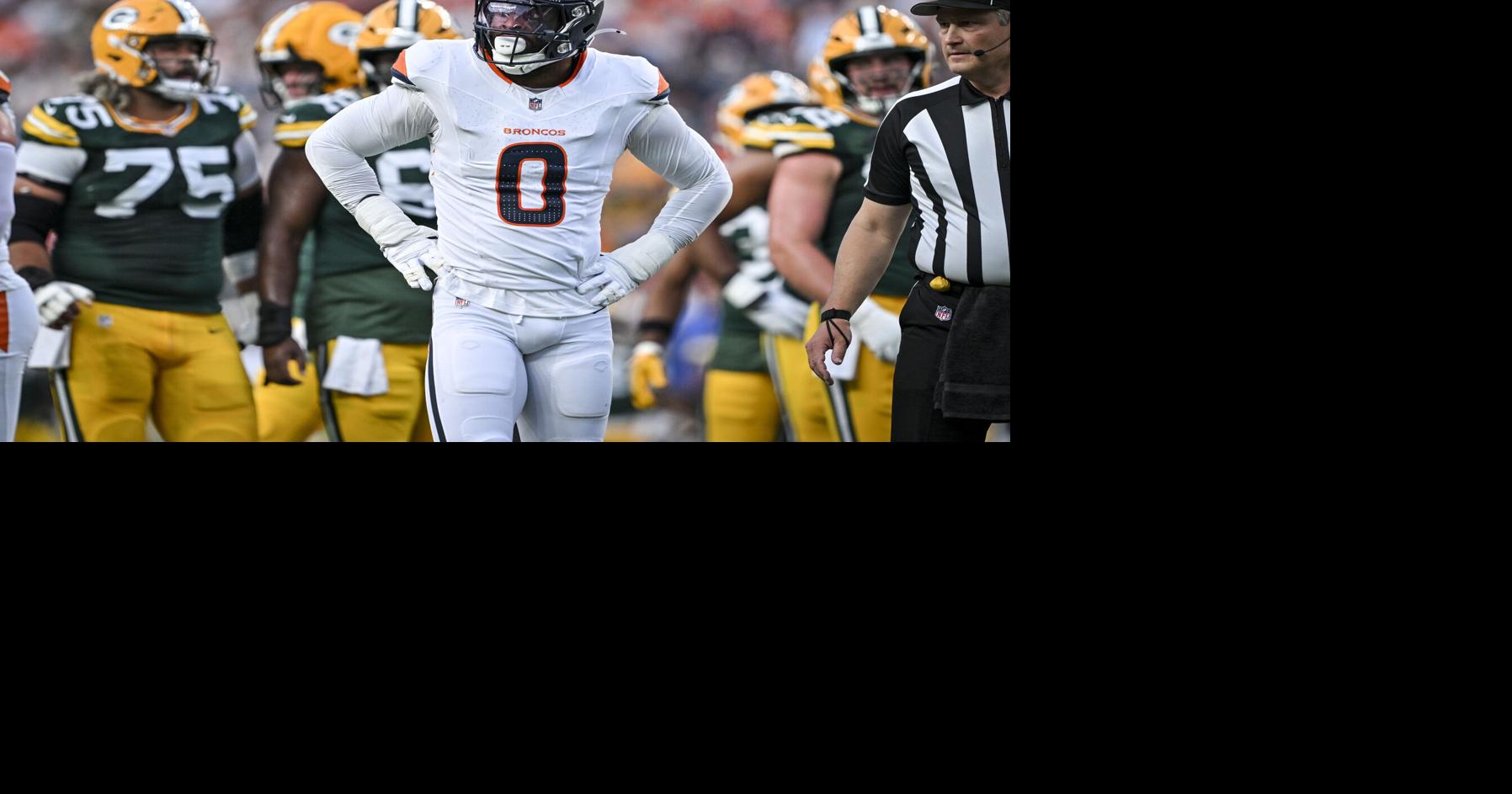 Jonathon Cooper of the Denver Broncos stands between plays during the first quarter against the Green Bay Packers at Empower Field at Mile High in Denver on Friday, Aug. 21, 2026.