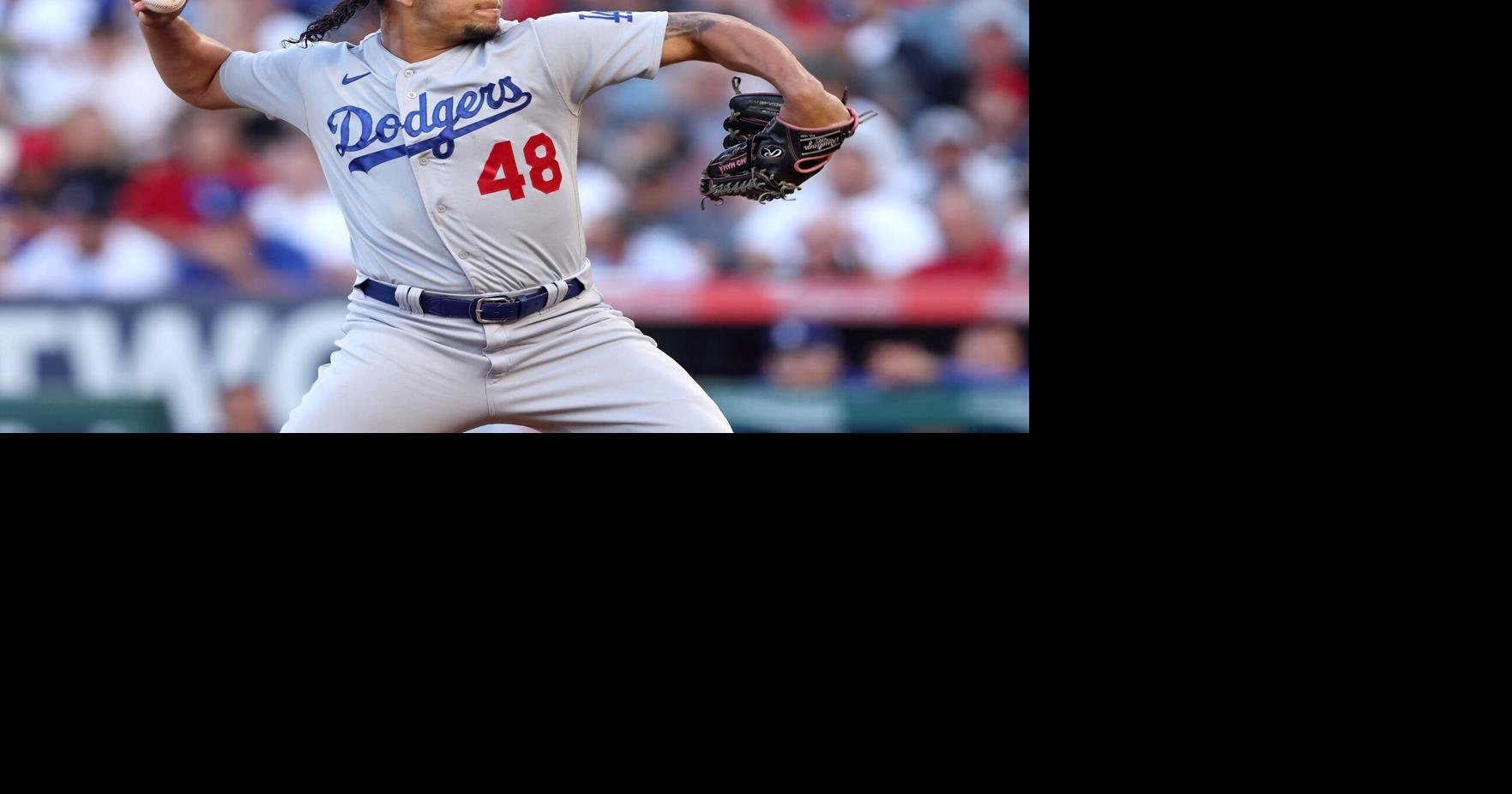 Dodger Pitcher Reunites With Player He Took Photo With as a Child