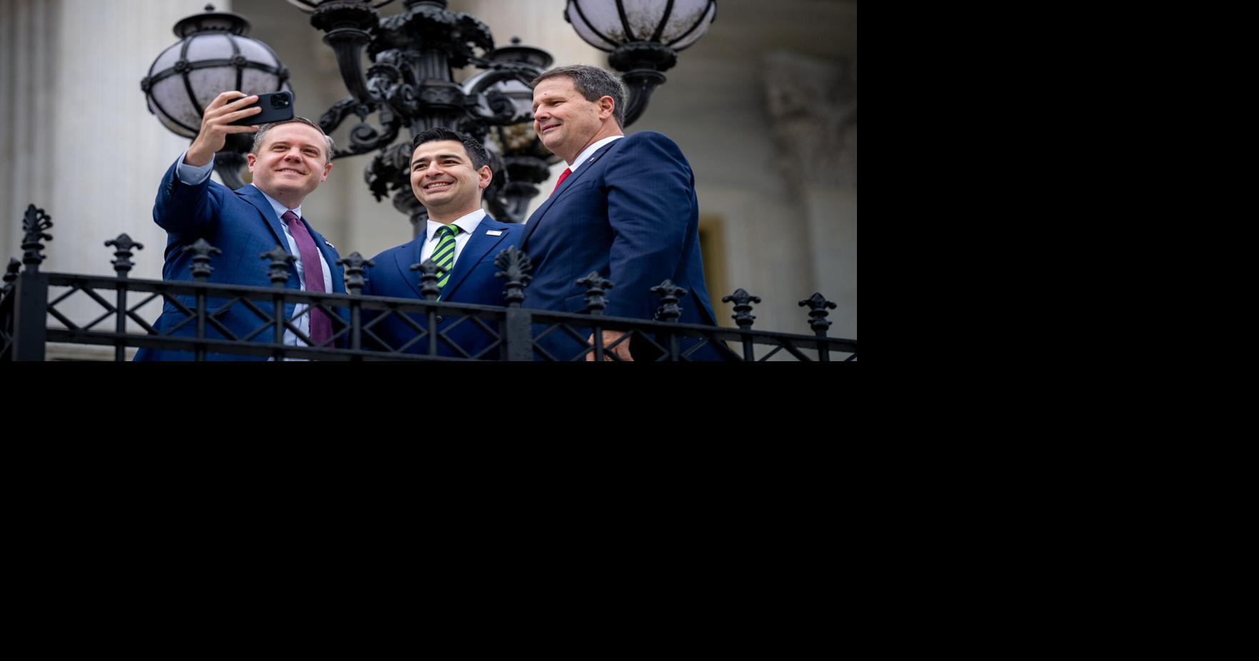 From left, Reps.-elect Jeff Hurd, Gabe Evans, and Jeff Crank pose for a photograph after joining other congressional freshmen of the 119th Congress for a group photograph on the steps of the House of Representatives at the U.S. Capitol Building on Nov. 15, 2024, in Washington, D.C..