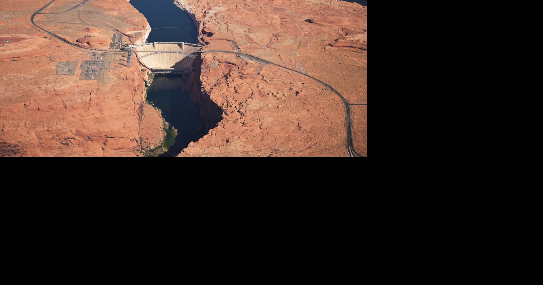 The Glen Canyon Dam is seen amid low water levels at Lake Powell on April 30, 2026, near Page, Arizona.