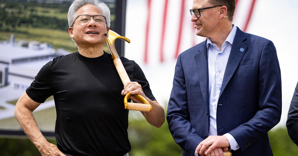 NVIDIA Founder and CEO Jensen Huang, left, jokes about working with a shovel while Coherent CEO Jim Anderson, right, laughs during a ground breaking ceremony at the advanced manufacturing facility in Sherman, Tuesday, June 16, 2026.