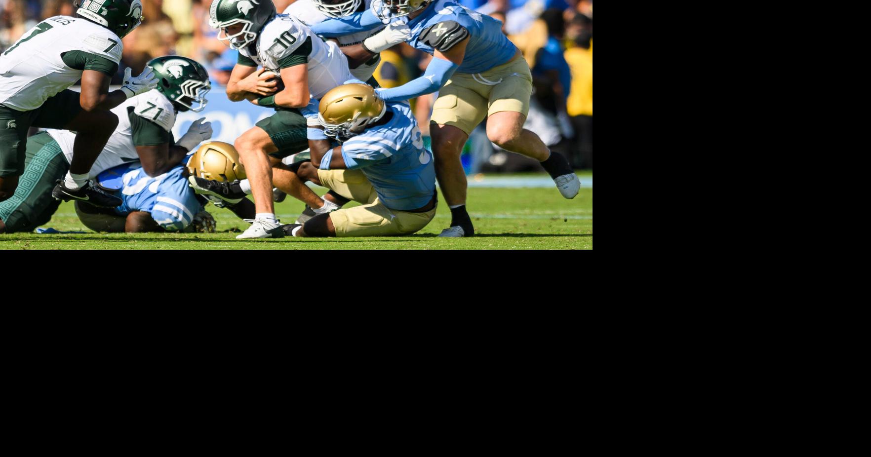 Michigan State quarterback Kayd Coffman is sacked during the first half against UCLA at the Rose Bowl on Saturday, Oct. 24, 2206, in Pasadena, California.