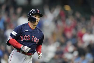 Yoshida goes deep twice, Red Sox score nine in eighth to beat Brewers 12-5, National Sports