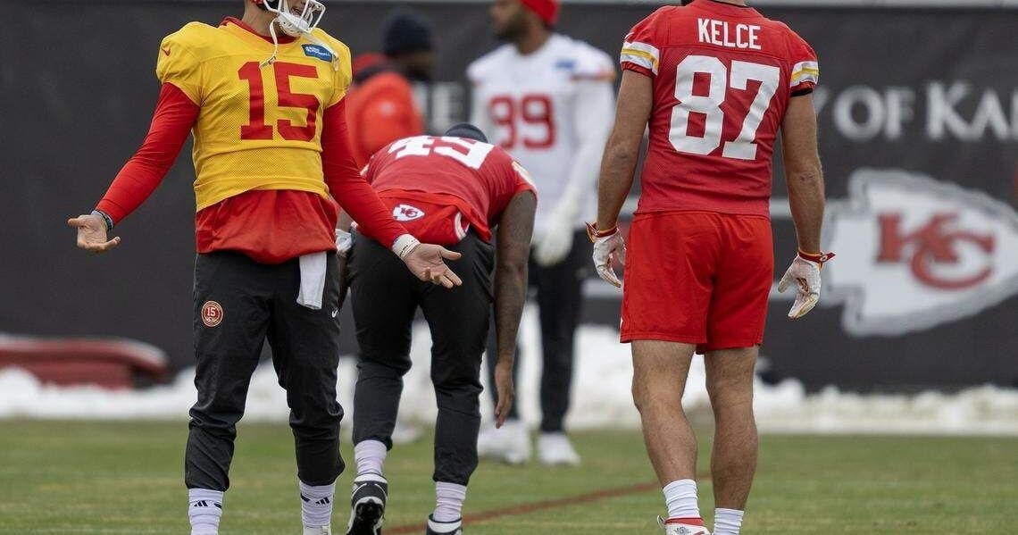 Kansas City Chiefs quarterback Patrick Mahomes and tight end Travis Kelce stretch during practice on Wednesday, Dec. 3, 2025, in Kansas City.