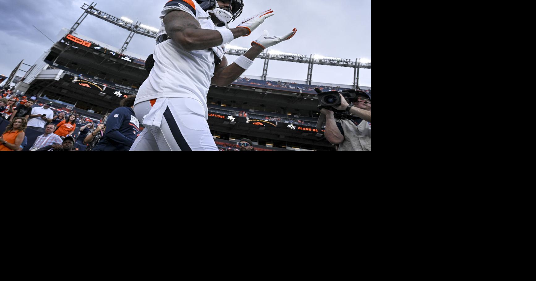 Denver Broncos wide receiver Jaylen Waddle takes the field before a preseason game against the Green Bay Packers at Empower Field at Mile High in Denver on Aug. 21, 2026.