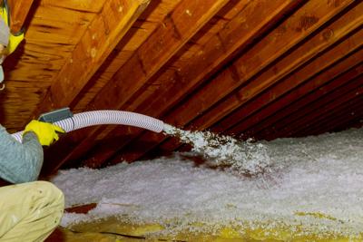 Blown-in insulation is an easy method for insulating an attic.