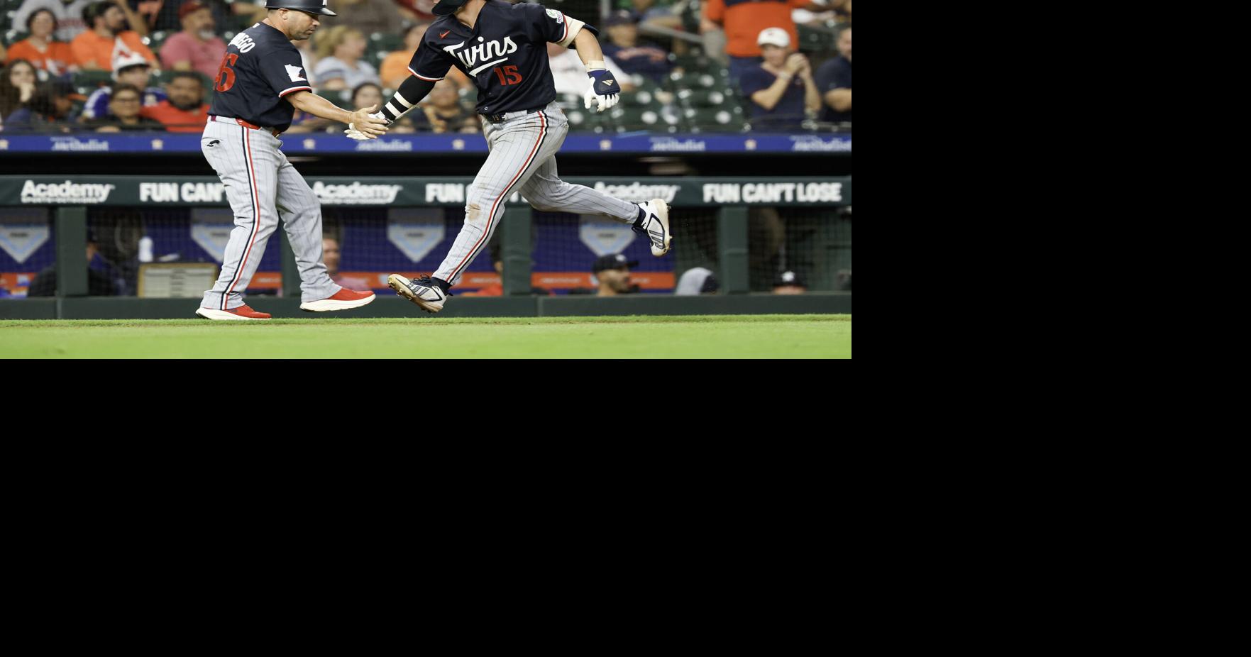 The Minnesota Twins' Luke Keaschall celebrates with third base coach Ramon Borrego hitting a solo home run during the eighth inning against the Houston Astros at Daikin Park on Wednesday, July 1, 2026, in Houston.