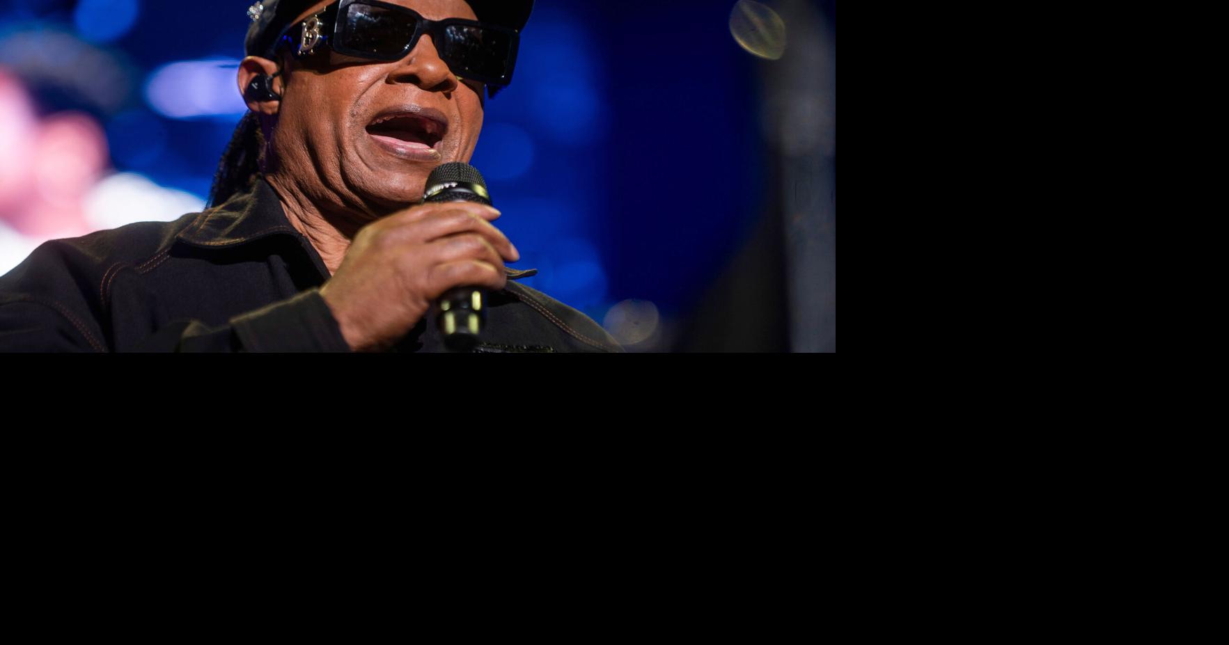 Stevie Wonder speaks before performing at Little Caesars Arena in Detroit on Oct. 22, 2024.
