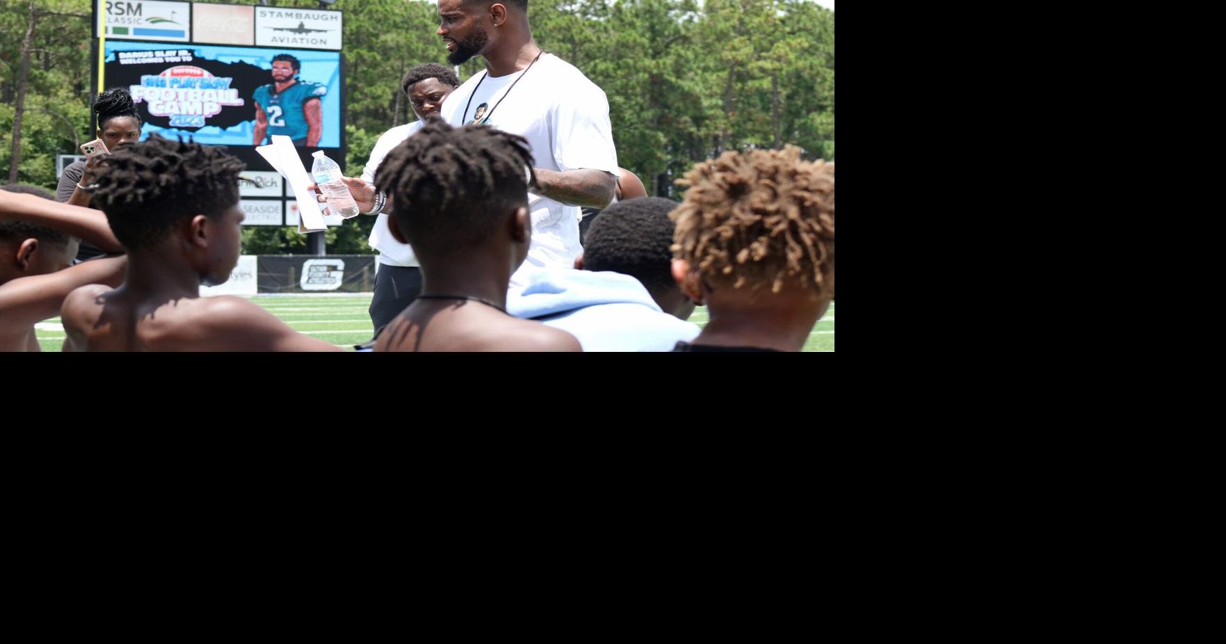 Darius Slay honored with High School jersey during youth football camp