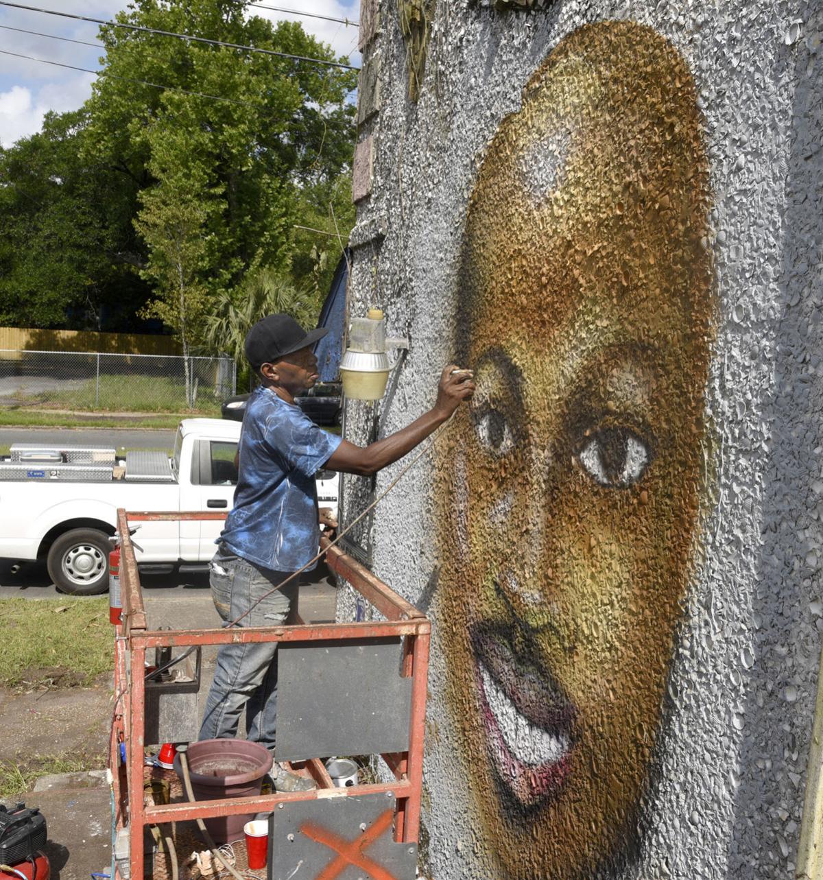 Artist Gives Life To Building With Arbery Mural Local News The