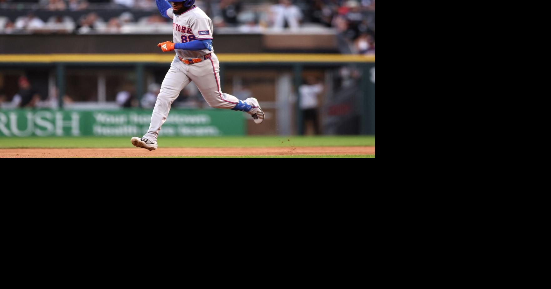 Luis Robert Jr. of the New York Mets celebrates hitting a two-run home run during the third inning against the Chicago White Sox at Rate Field on Saturday, Aug. 22, 2026, in Chicago.