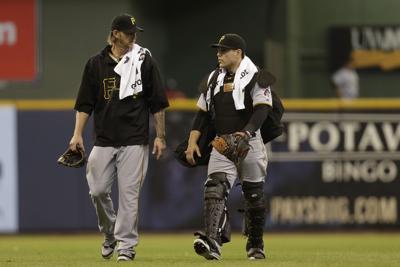 Ron Cook: A.J. Burnett, Russell Martin home opener reunion reminds Pirates  fans of better times, National Sports