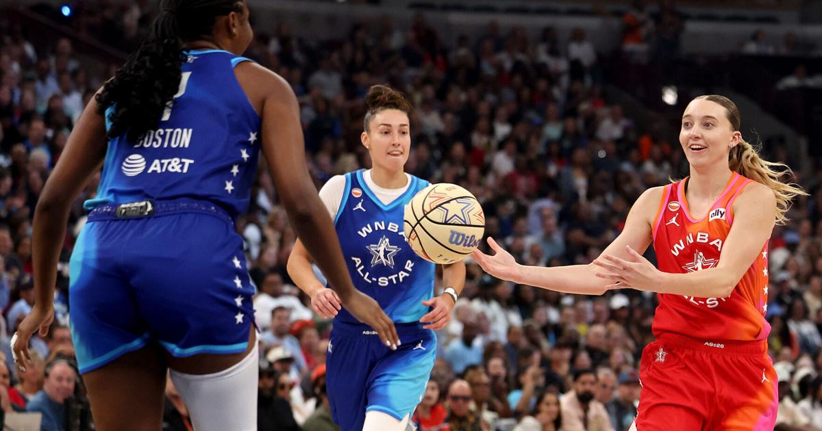 Paige Bueckers of Team Coop looks for the ball against Aliyah Boston of Team Spoon during the first half in the 2026 AT&T WNBA All-Star Game at the United Center on Saturday, July 25, 2026, in Chicago.