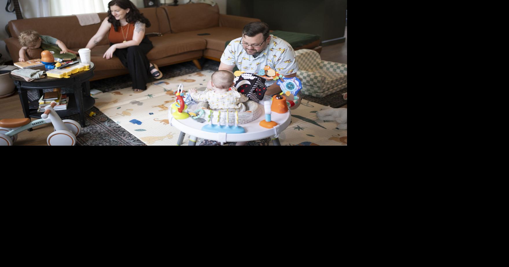 Jen and Ryan Stewart, a dual-income couple, play with their kids at home in Stillwater, Minnesota, on Friday, June 26, 2026.