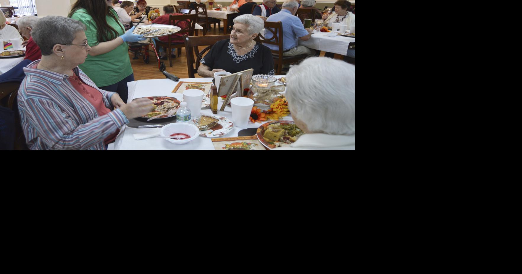 Students serve St. Mark's Towers residents for Thanksgiving Local
