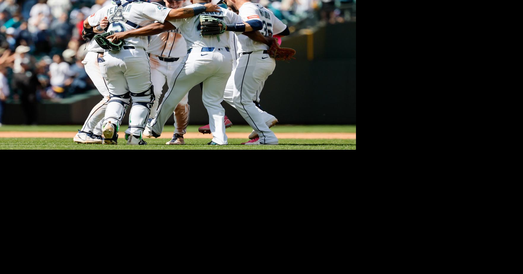 The Seattle Mariners' infield dances after a 5-4 victory against the Chicago White Sox at T-Mobile Park on May 20, 2026, in Seattle.