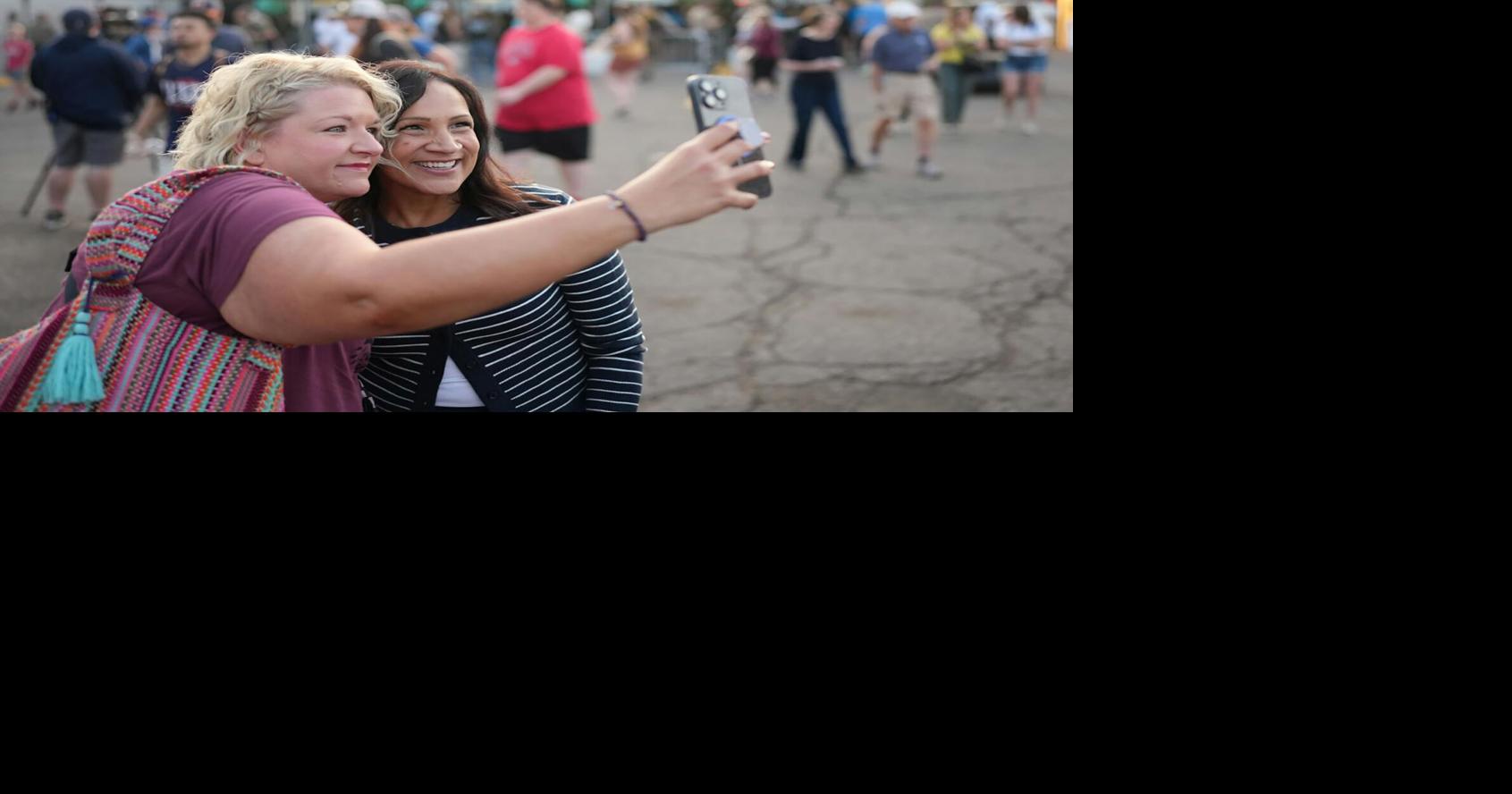 April Ross, left, takes a selfie with Republican gubernatorial candidate Lisa Demuth at the Minnesota State Fairgrounds on Aug. 27, 2026, in Falcon Heights, Minnesota.