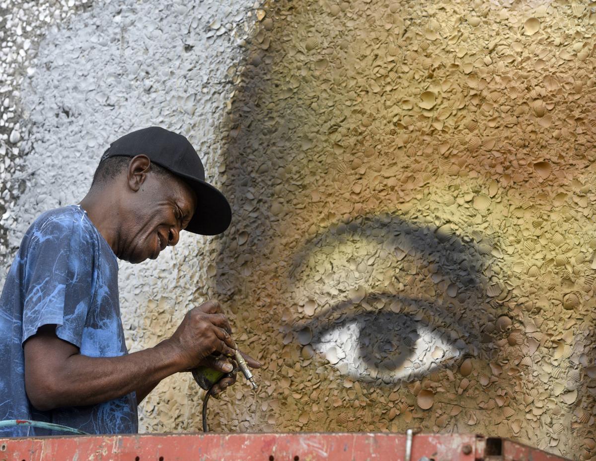Artist Gives Life To Building With Arbery Mural Local News The