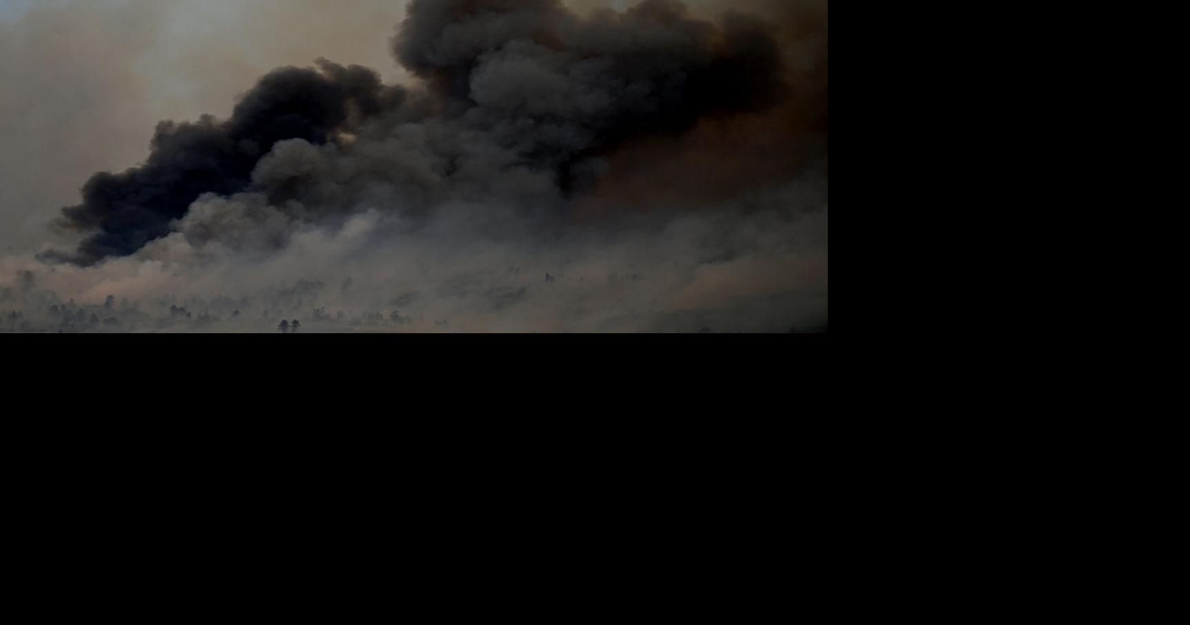 Dark smoke fills the sky as the Aspen Acres Fire continues to burn on Wednesday, July 1, 2026, near Beulah, Colorado.