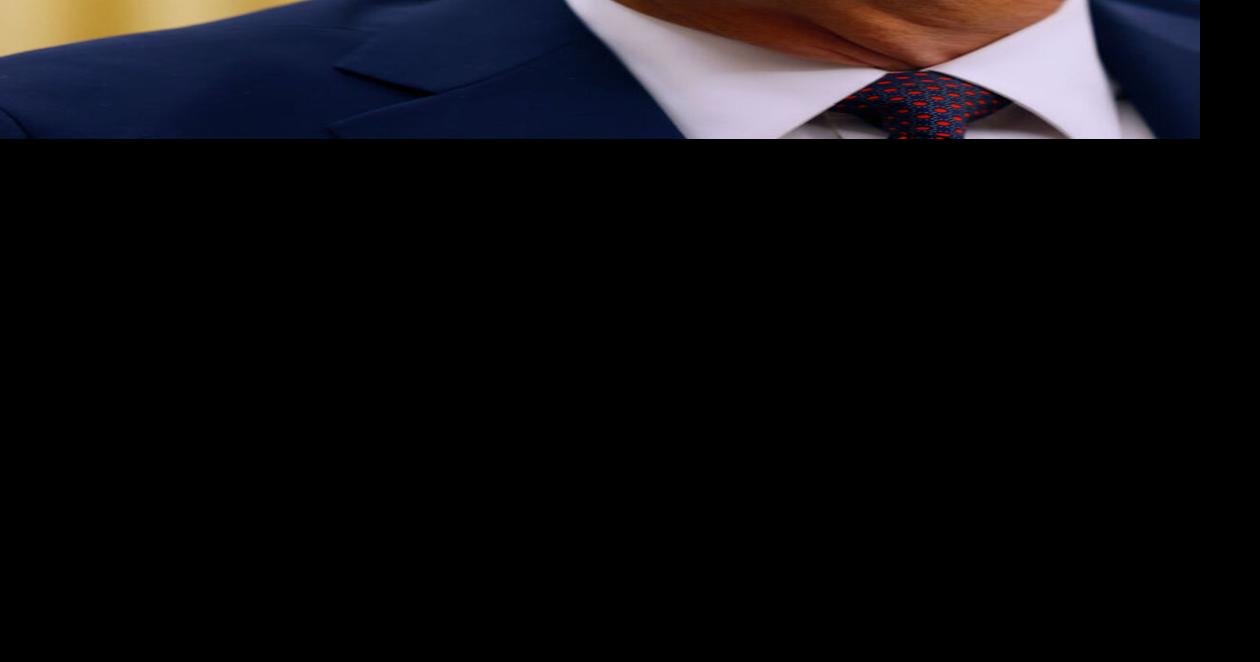U.S. President Donald Trump speaks to reporters after signing a series of executive orders in the Oval Office of the White House on Jan. 23, 2025, in Washington, DC.