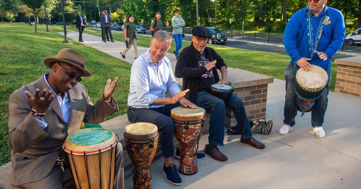 Ned Lamont is facing challenger Josh Elliott in the Democratic primary for governor in August. Both say that more affordable housing is needed across the state. Here, Lamont plays the drums with members of Calling All Brothers as students at Dr. Martin Luther King Jr. Middle School are welcomed back on the first day of school, on Aug. 26, 2025, in Hartford, Conn..