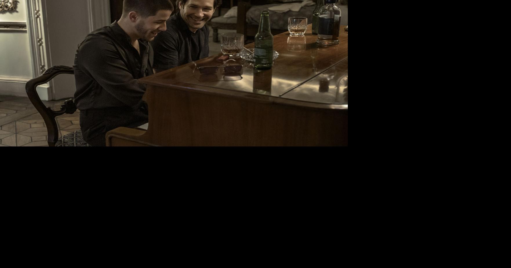 Nick Jonas, left, and Paul Rudd in 
