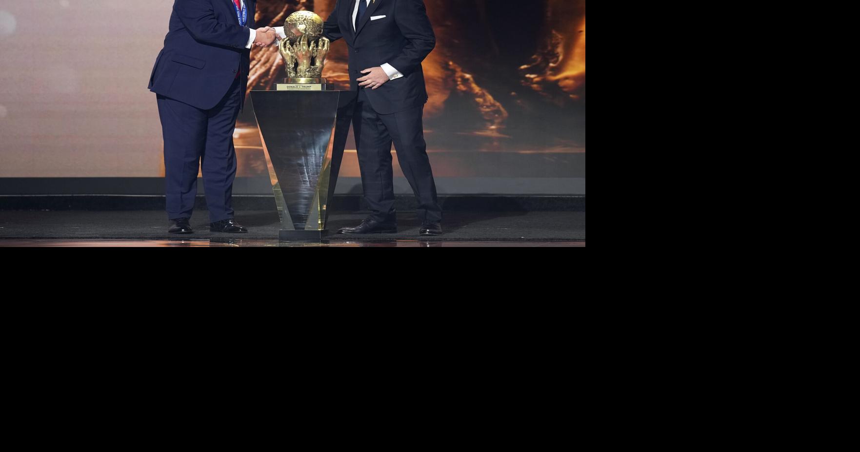 U.S. President Donald Trump receives the FIFA Peace Prize from FIFA President Gianni Infantino at the FIFA World Cup 2026 Official Draw at the John F. Kennedy Center for the Performing Arts Dec. 5, 2025, in Washington, D.C. The 2026 FIFA World Cup will take place between June 11 and July 19 featuring 48 teams with matches being played in the United States, Mexico and...