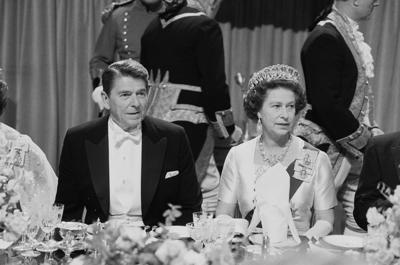Ronald Reagan, 40th President of the United States, and the Queen of the United Kingdom Elizabeth II at a gala dinner at Windsor Castle, UK, on June 9, 1982.